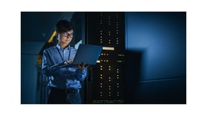 IT professional working on computer.